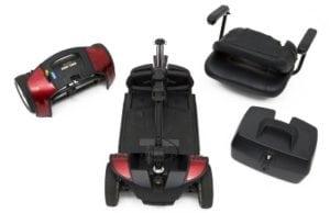 This photo shows a pride mobility scooter broken down into four pieces which makes the reservation experience even simpler for our customers. Make your booking  reservation for you full size or Travel size scooter today.